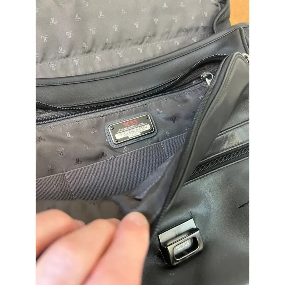 Tumi black leather